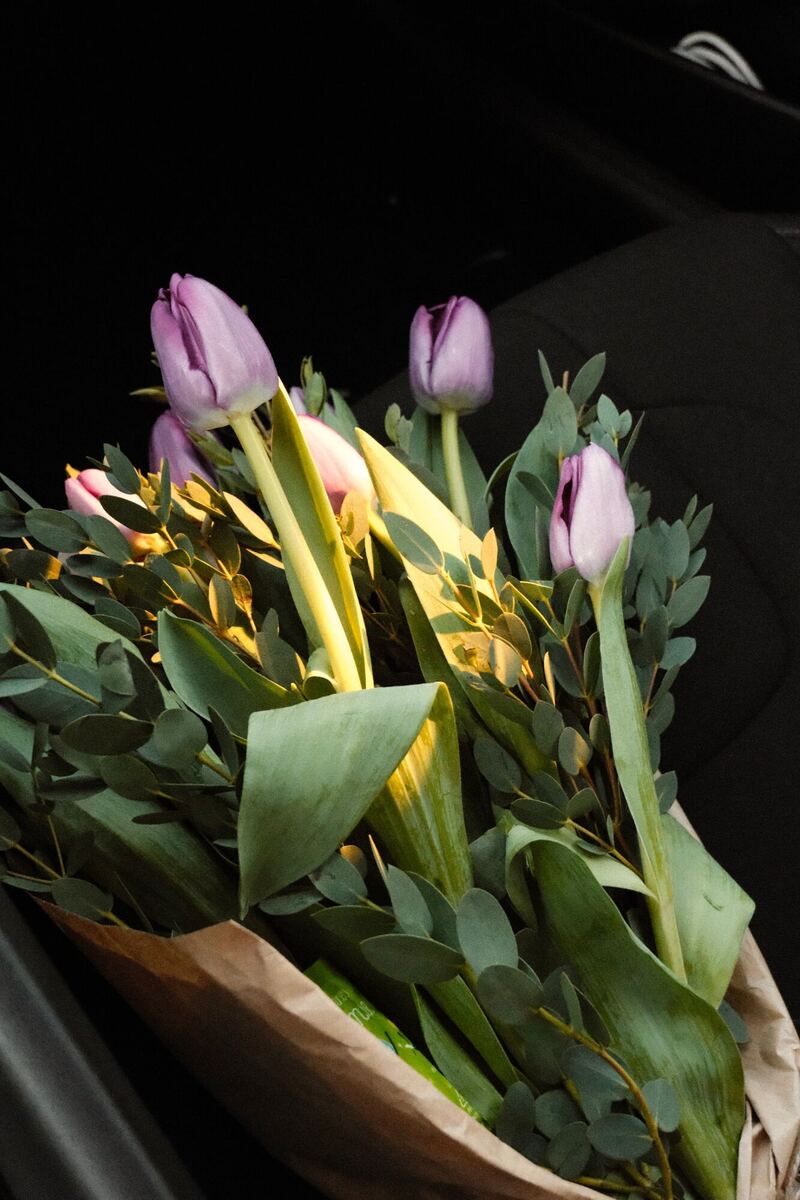 Purple tulips in kraft paper